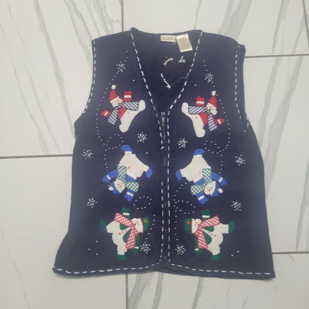 Navy blue Christmas sweater vest with snowmen and snowflakes